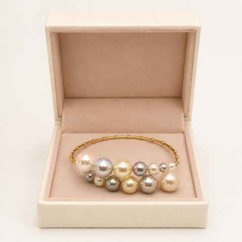 Bracelet: Celestial Tide Japanese Akoya Pearl Bangle in 18K gold by House Of Pearls