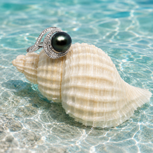 Tahitian South Sea Pearl Ocean Swirl Ring by House Of Pearls, black pearl set on a diamond-studded silver band.