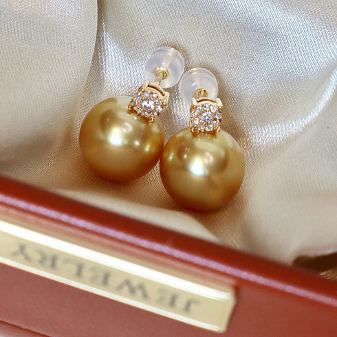 Earrings, 10–12mm Golden South Sea Pearl with diamond halo in 18K gold by House Of Pearls - FT