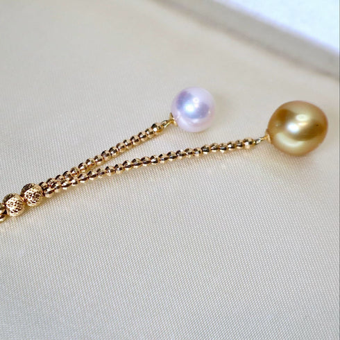 Y-necklace with 11–12mm lavender Tahitian pearl and golden South Sea pearl on an 18K gold chain