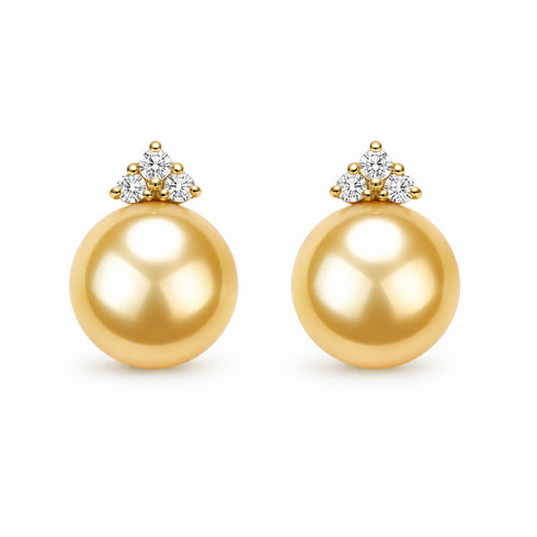 Pair of Ellie earrings in 18K gold with 10–12mm golden South Sea pearls and diamond clusters