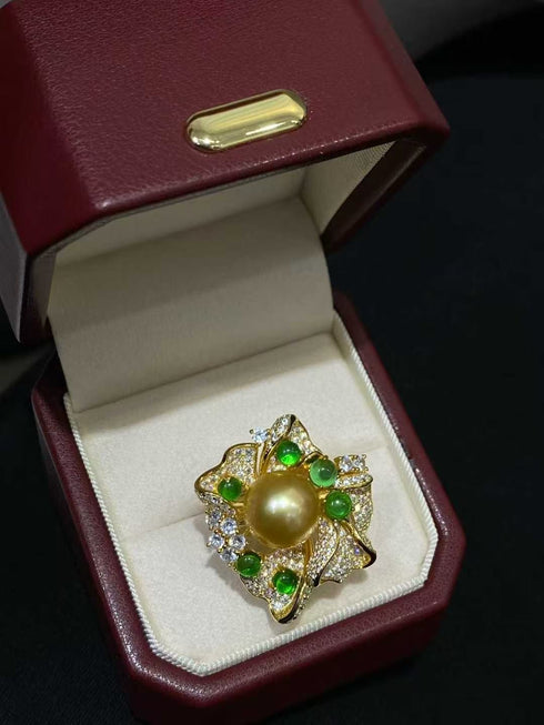 12mm Golden South Sea Pearl Flower Ring in gold with emerald-green stones and pavé diamonds