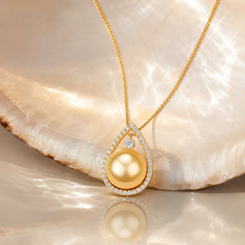 10-11mm Golden South Sea Pearl Teardrop Pendant Necklace with diamond halo on gold chain.