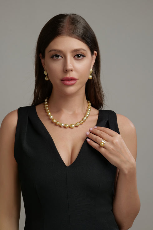 Earrings: 12-13mm Golden South Sea baroque pearl brushed gold oval drop