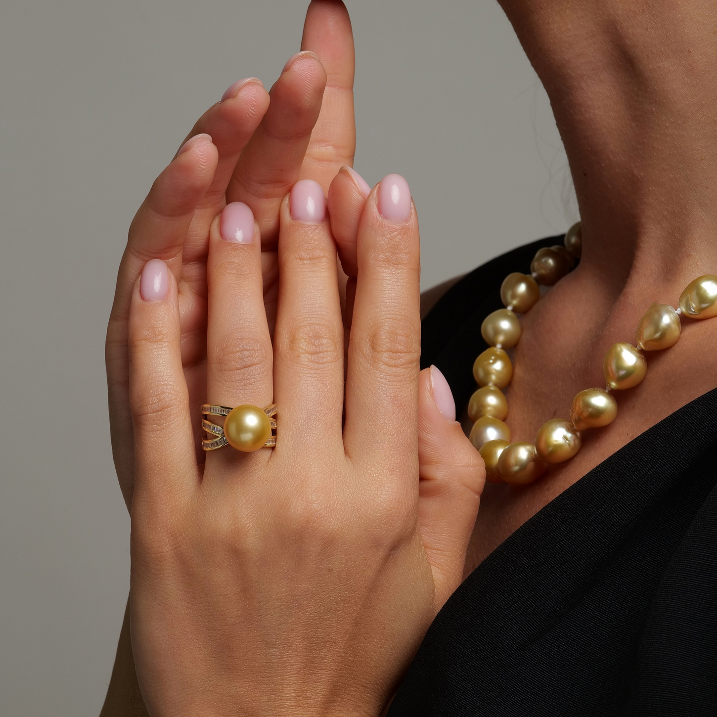 Ring with a 12–13mm golden South Sea pearl on a minimalist gold band
