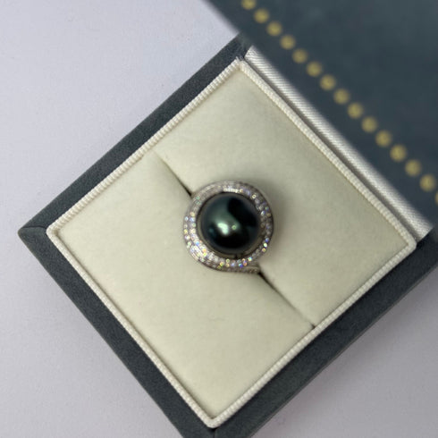 Ring with 11-12mm Tahitian pearl, ocean swirl halo, pave diamond accents, in presentation box