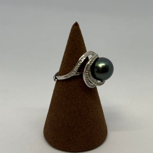 Ring featuring an 11–12mm Tahitian pearl with a pavé-diamond swirl band