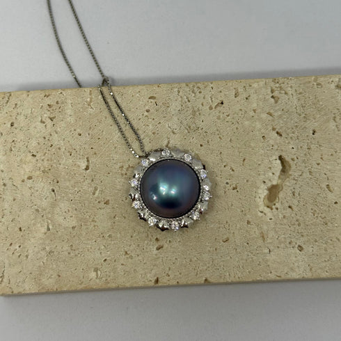 Blue Mabe Pearl Halo Pendant Necklace by House of Pearls on a silver chain