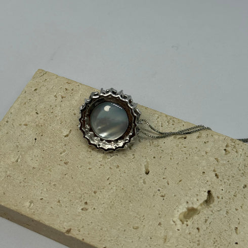 Blue Mabe Pearl Halo Pendant Necklace by House of Pearls on silver chain.