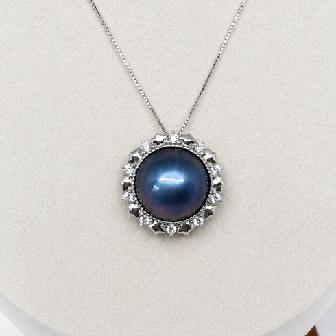 Blue Mabe Pearl Halo Pendant Necklace by House of Pearls, silver-tone setting with clear stones.