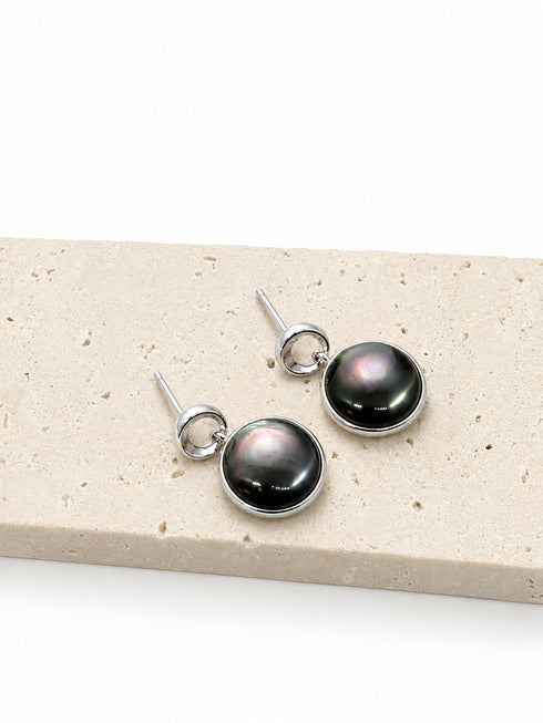 Earrings: 6-7mm black mother-of-pearl noir nacre drops in silver bezel, House Of Pearls pair