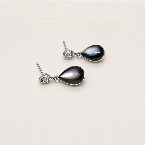 Pair of teardrop Tahitian shell earrings in silver settings with crystal-accented tops, House Of Pearls