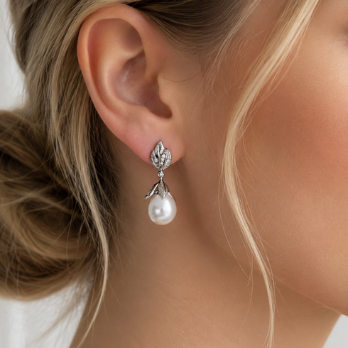 Earrings by House Of Pearls: botanical leaf drop with 10–11mm Australian White South Sea pearl, silver