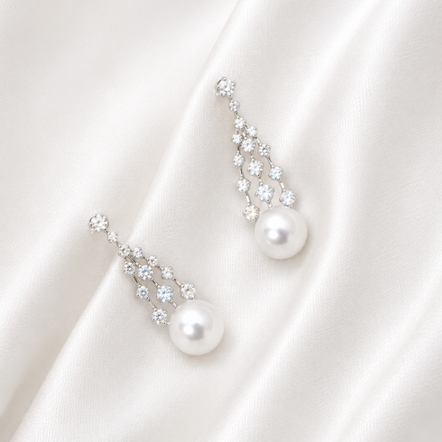 Earrings: 8–9mm freshwater pearl CZ celestial drop with crystal-studded chain