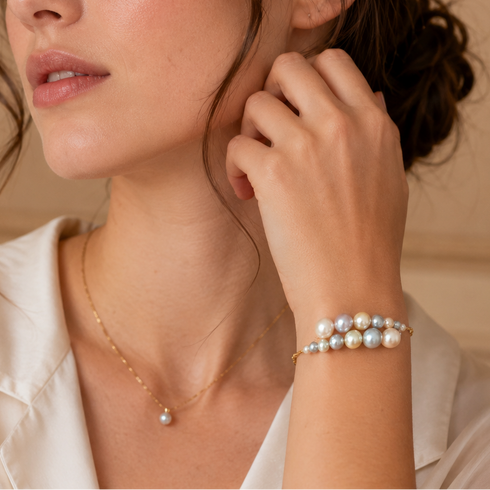 Celestial Tide Japanese Akoya Pearl Bangle Bracelet in 18K gold with two-row pearl strands