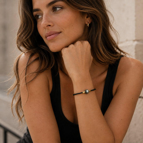 Bracelet: 9-10mm Tahitian pearl leather bracelet by House Of Pearls -TA; black cord with gray pearl and gold-tone accents.