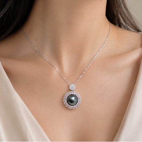 Necklace: 11-12mm Tahitian pearl pendant with pink and white CZ halo on sterling silver chain