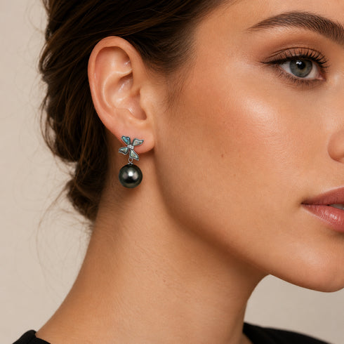 Earrings: 10-11mm Tahitian Pearl Butterfly Drop with iridescent blue-green butterfly studs and a black pearl drop