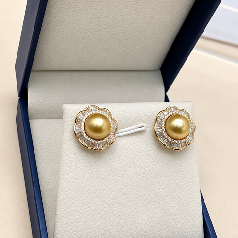 Earrings, Golden South Sea pearl floral halo studs, 9–10mm pearls with crystal halo in blue box.