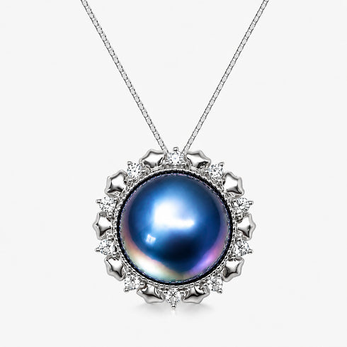 Halo pendant necklace with 13-14mm blue Mabe pearl, silver setting and clear stones