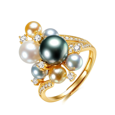 Open ring with a constellation of mixed seawater pearls on a gold band, accented by diamonds