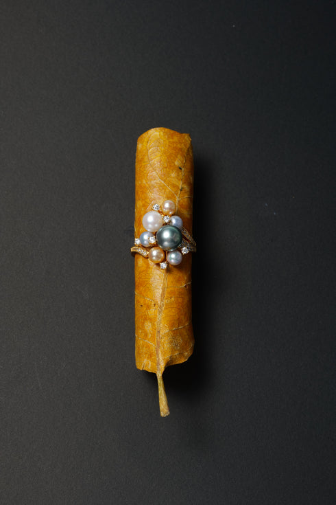 Rings House Of Pearls XM Tahitian Pearl Sapphire Halo Ring with a pearl cluster on a gold band