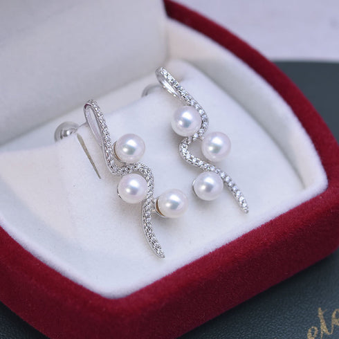 Pair of Earrings: Elegant Curve 925 Silver & Freshwater Pearl Studs by House Of Pearls - VA