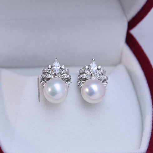 Bling CZ Pearls Earrings pair with white pearls and crystal accents in a silver-tone setting