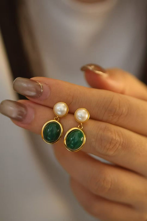 Oval malachite bezel pearl drop earrings, a pair with gold-tone settings, white pearls and green malachite drops