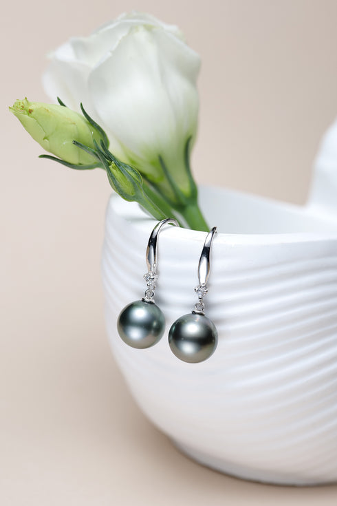 Earrings: Tahitian black pearl drop earrings, 11–12mm, 18K white gold with diamond accents