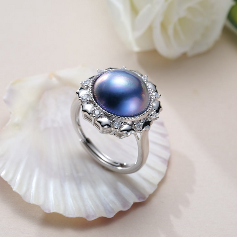 12mm Blue Mabe Pearl Halo Open Ring in silver with diamond halo