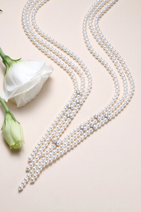 V-Shaped Aurora Pearl Necklace, House Of Pearls - TA; multi-strand white pearls with crystal accents.