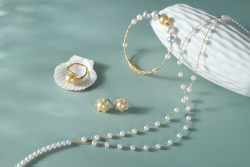 Pearl necklace with 5–6mm freshwater pearls in a gold vermeil double-layer cascade design, part of a pearl jewelry set