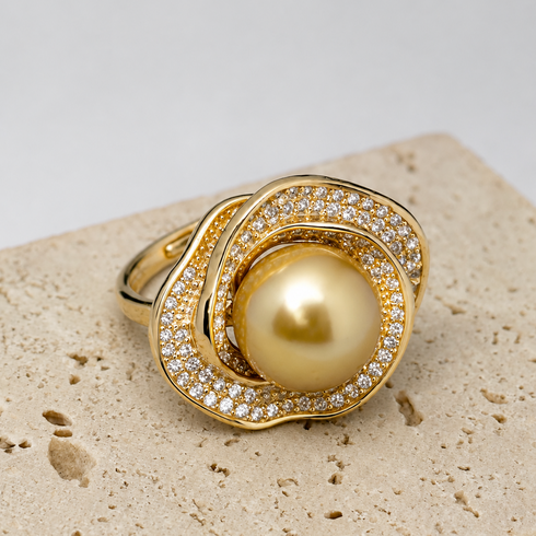 Ring with a 10–11mm Golden South Sea pearl encircled by a pavé diamond rose halo
