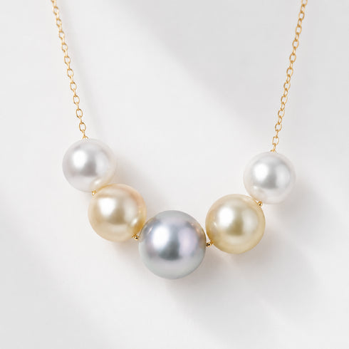Smile Multicolor Seawater Pearl Necklace on a gold chain with five pearls.