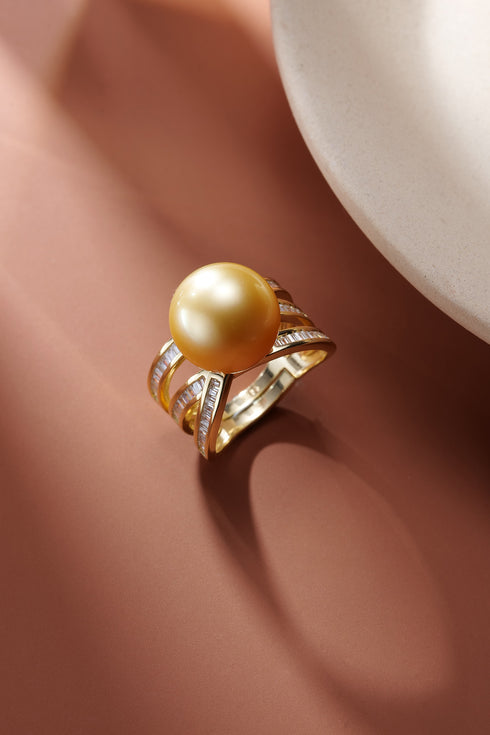 12-13mm minimalist golden South Sea pearl ring with a multi-band gold setting and clear-stone accents