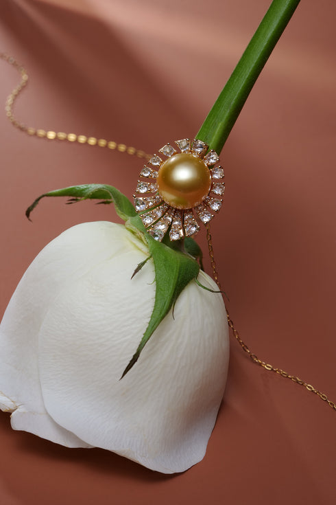 Necklace: AAA Grade 10–11mm Golden South Sea pearl sunburst pendant with crystal accents on a gold chain
