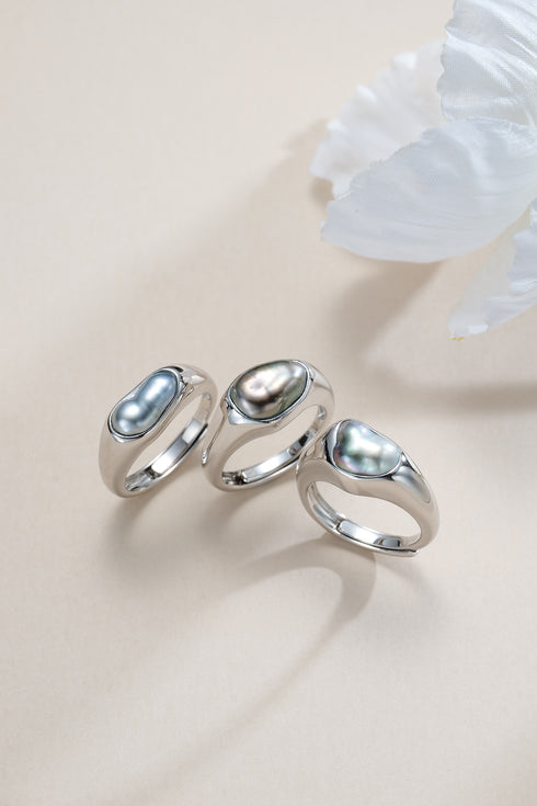 Rings: set of 3 silver Tahitian pearl halo rings with dark, lustrous pearls