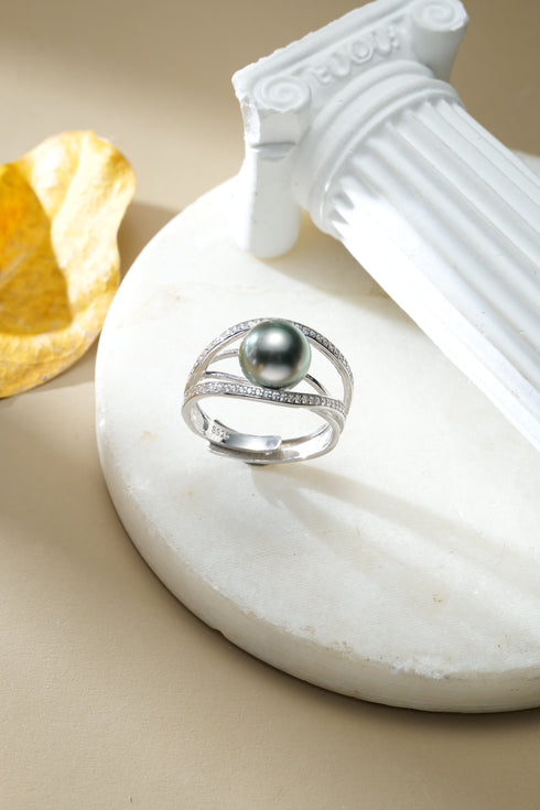 Tahitian pearl sapphire halo ring in sterling silver with pave diamond bands