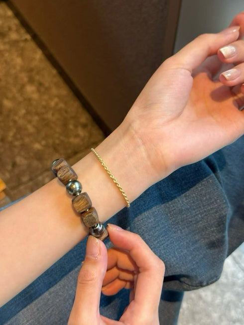 Bracelet: Agarwood & Golden South Sea Pearl Stretch by House Of Pearls; wooden beads with metallic spacers