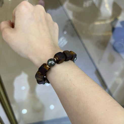 Agarwood & Golden South Sea Pearl Stretch Bracelet with dark brown wood beads and metallic round beads