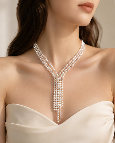 V-shaped Aurora Pearl Necklace with multiple pearl strands forming a layered drape.