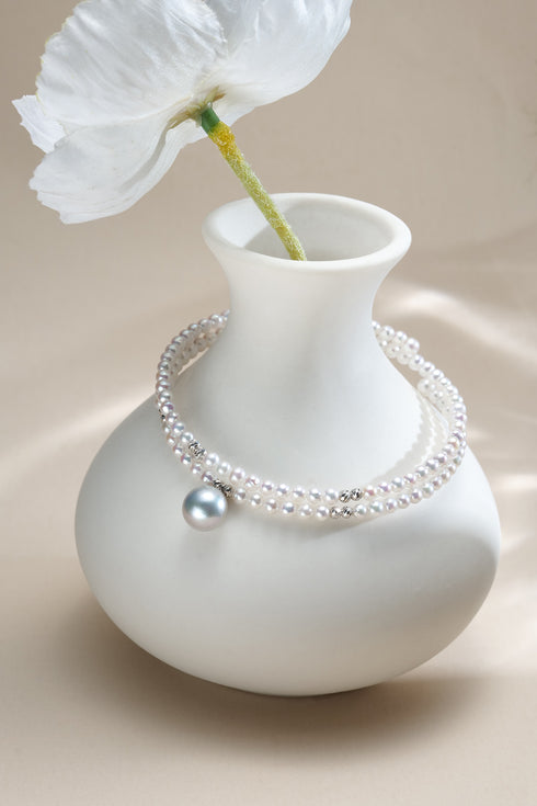 Double-Strand Akoya Pearl Wrap Bracelet with pale blue centerpiece pearl and silver spacers