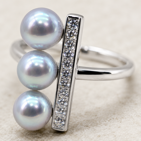 Ring with three 6-7mm silver-blue Japanese Akoya pearls and a CZ line on an open silver band