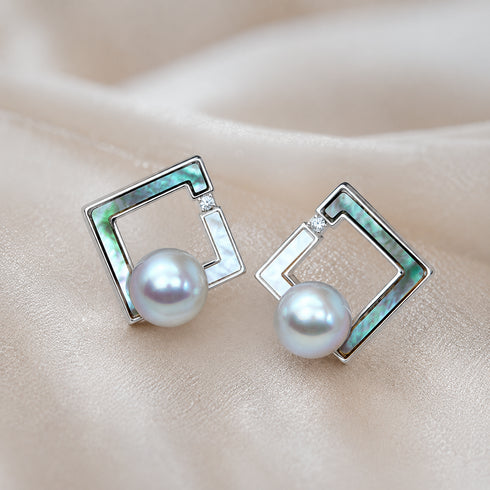 Earrings: 7–8mm Japanese Akoya pearl square stud pair with silver geometric frames and blue-green abalone shell.