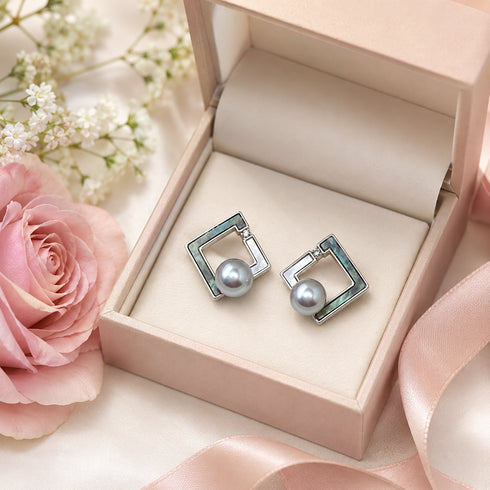Earrings: House of Pearls Akoya square pearl studs with blue-gray pearls in silver geometric frames