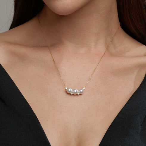 Akoya pearl pendant necklace with 7–9mm pearls and cubic zirconia accents on 18K gold chain