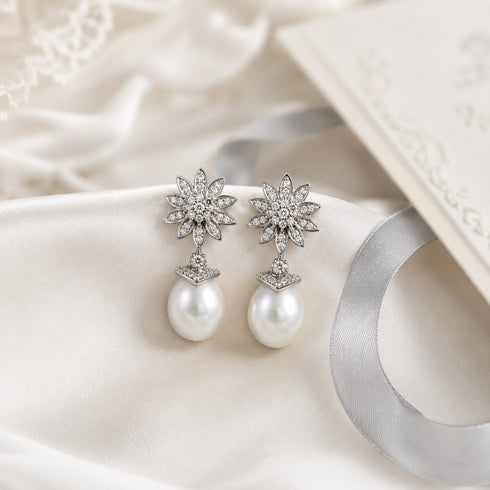 Earrings, 11-12mm White South Sea oval pearl flora drop, silver-tone with pavé crystals, set of 2