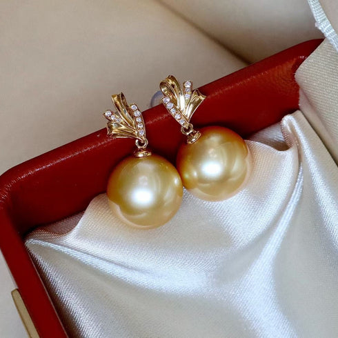 Earrings: 12-13mm Golden South Sea pearl diamond drop earrings in 18K gold
