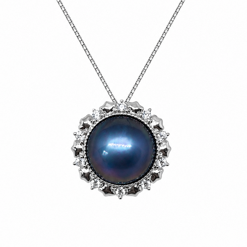 Blue Mabe Pearl Halo Pendant Necklace with silver setting and surrounding crystal stones on a delicate chain